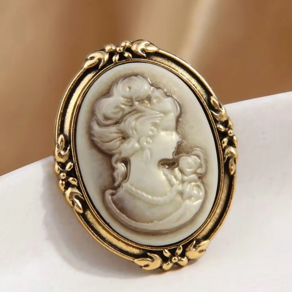 New vintage-style looking cameo brooch resin portrait gold-toned metal frame
